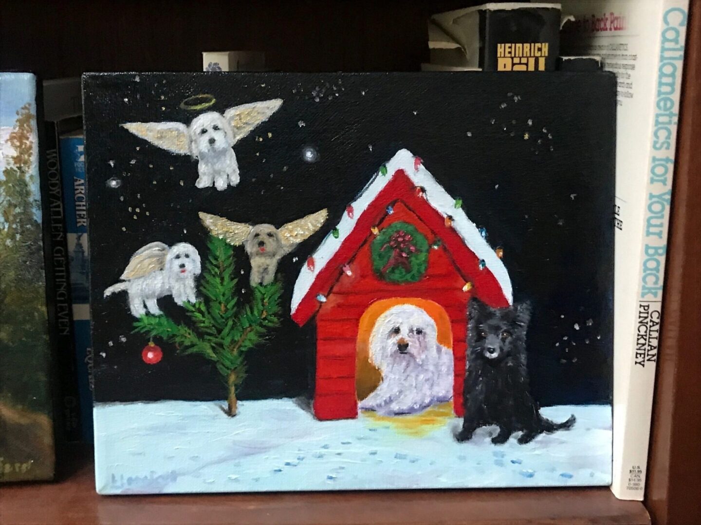 A painting of dogs in the snow with christmas decorations.