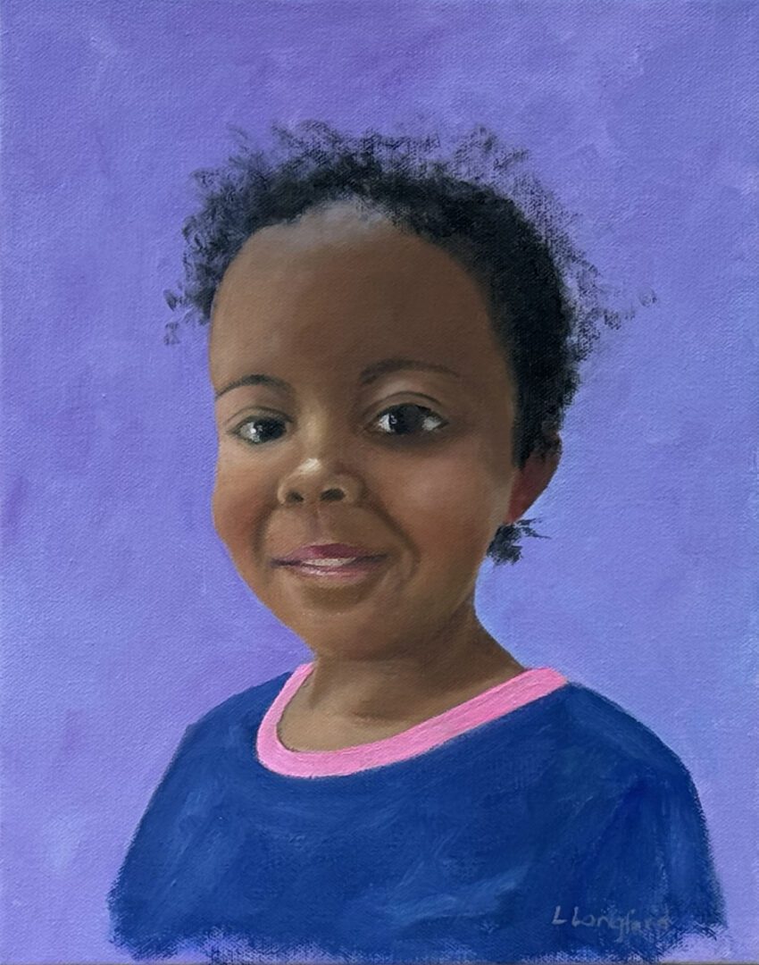 Portrait of a smiling child on purple background.